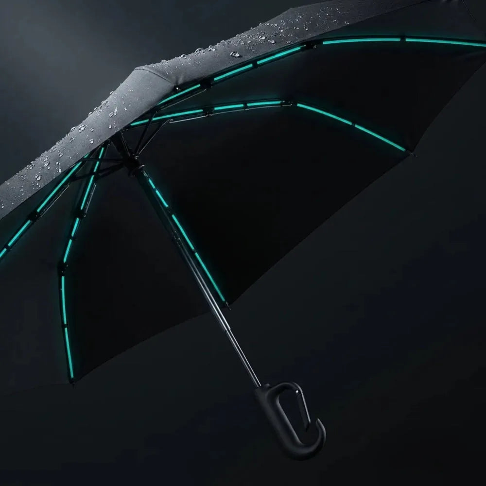 Underside of the Umbremo canopy showing the eight flexible ribs with water beading on the fabric